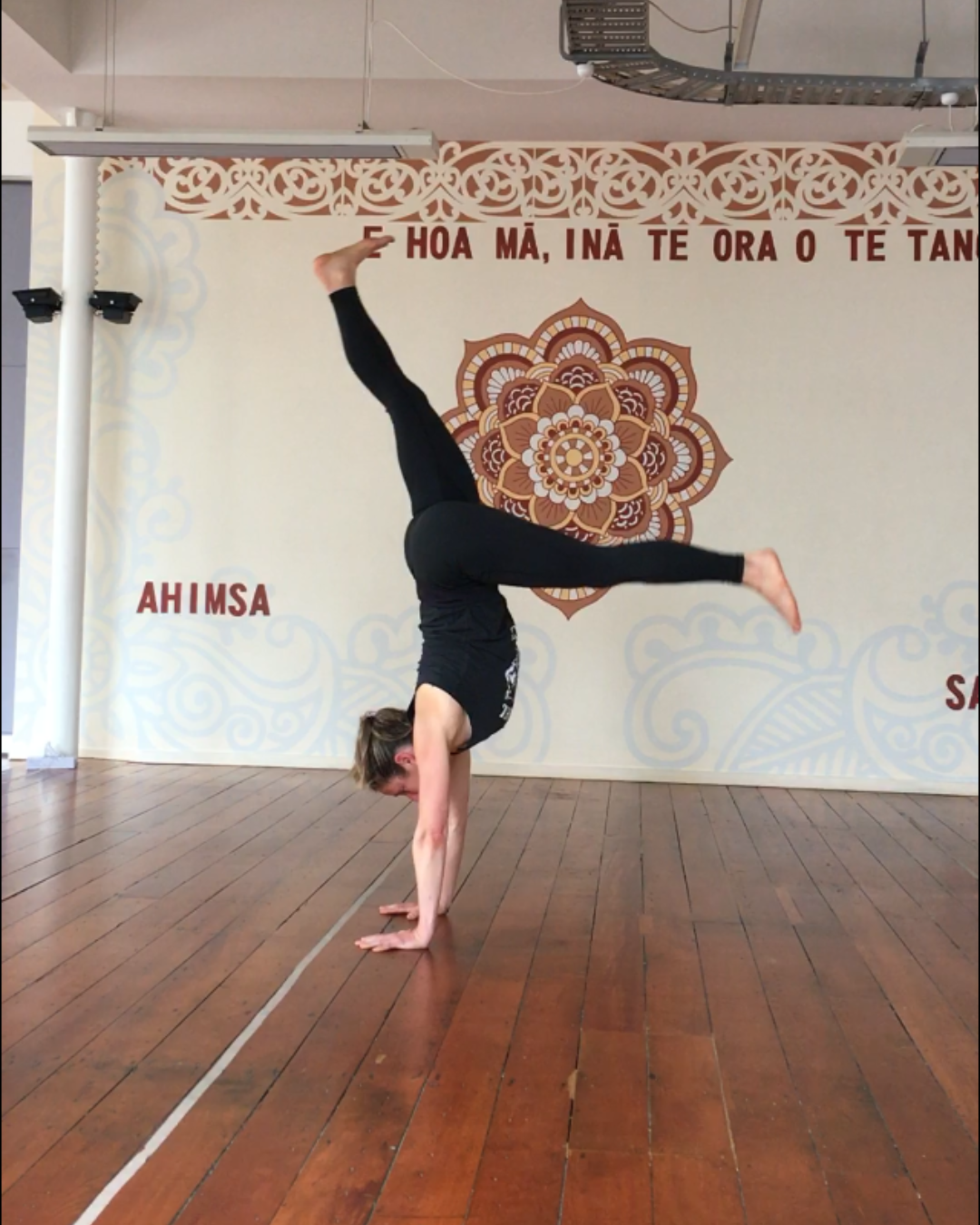 KK doing L-shaped handstand